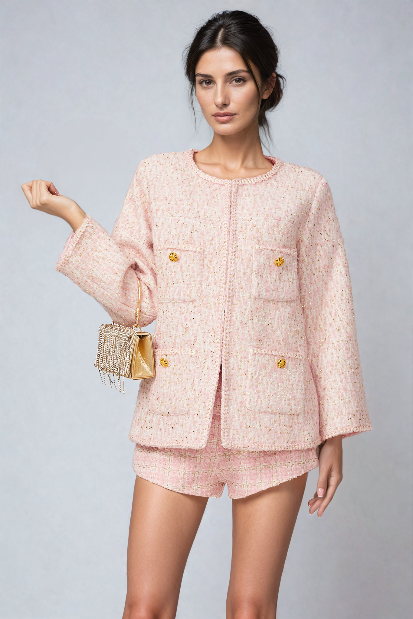 Pink tweed jacket with braided edges